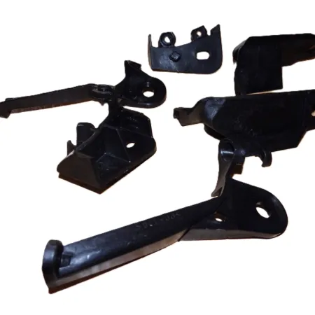 Uchwyty reflektora Opel Corsa D